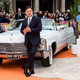 Russell Crowe and a Cadillac, but probably not one you will be able to drive with BOOK by Cadillac. (Image: AP)
